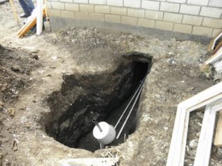 Как пробить отверстие в фундаменте под канализацию
