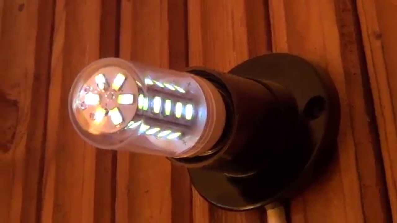 Почему светодиодный светильник продолжает тускло светиться при выключенном двухклавишном выключателе